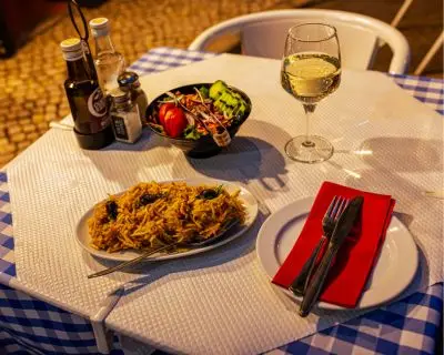 Bacalhau à Brás with white wine at Loja das Conservas Petiscos