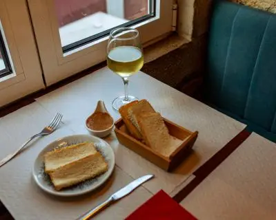 sardine-and-tuna-pate-with-bread-and-white-wine-at-solido-fado